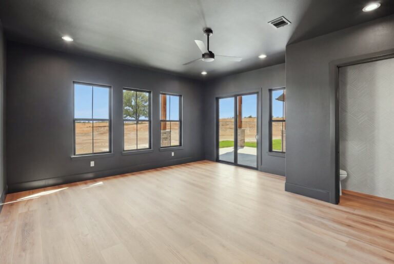 Flex room with dark accent walls at 2077 Preserve Trail by M2 Luxury Homes in Timberview Preserve