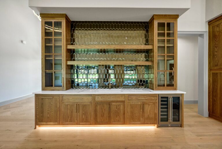Butler pantry with white oak cabinetry at 519 Royal Santana Run