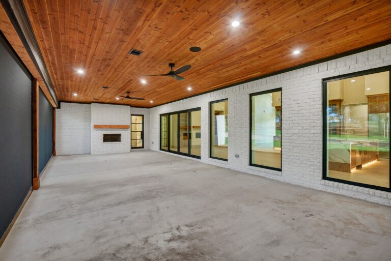 Covered patio with wood ceiling at 519 Royal Santana Run