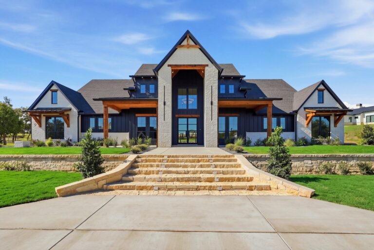 Front exterior of 519 Royal Santana Run, a modern farmhouse by M2 Luxury Homes