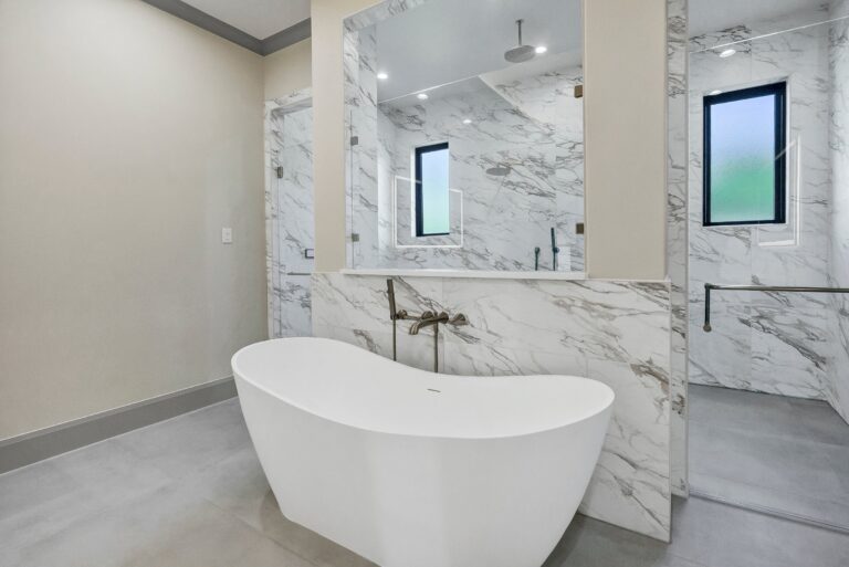 Spa-inspired primary bath with freestanding tub at 519 Royal Santana Run